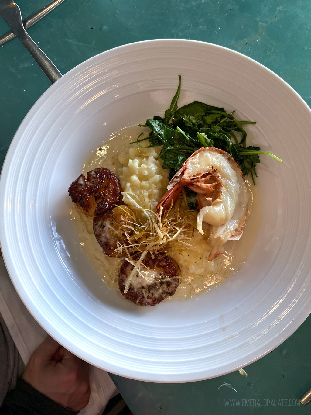 scallops, lobster, and risotto from a restaurant in Kauai