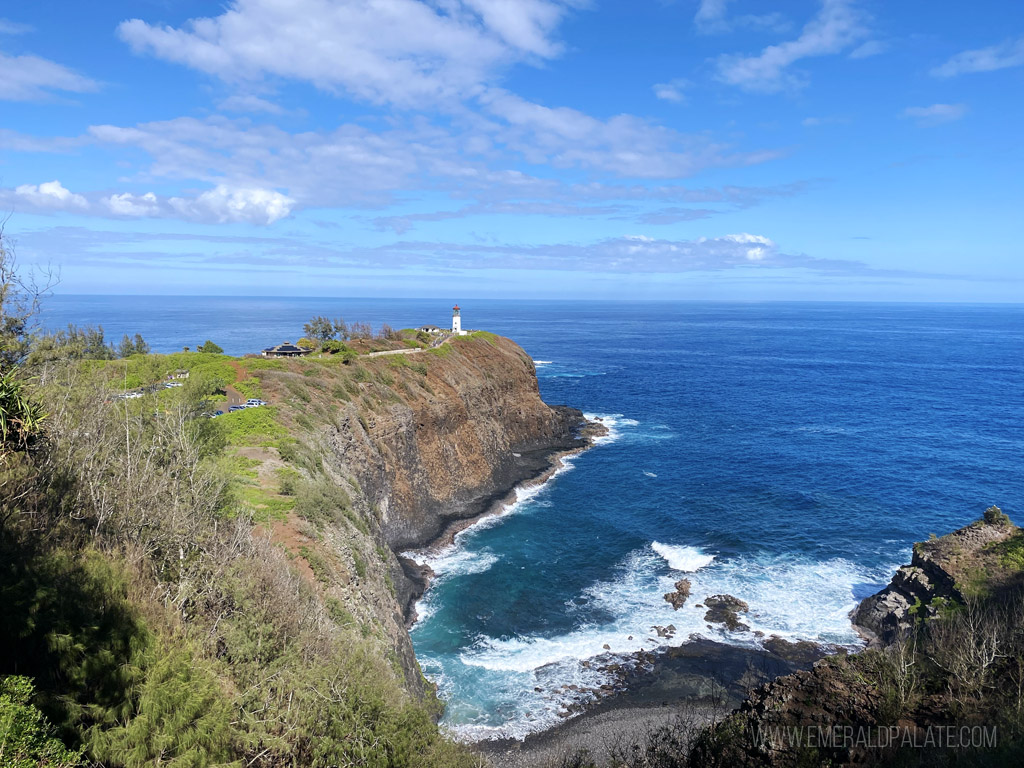 scenic viewpoint of a lighthouse on the coast, a must visit during your Kauai itinerary