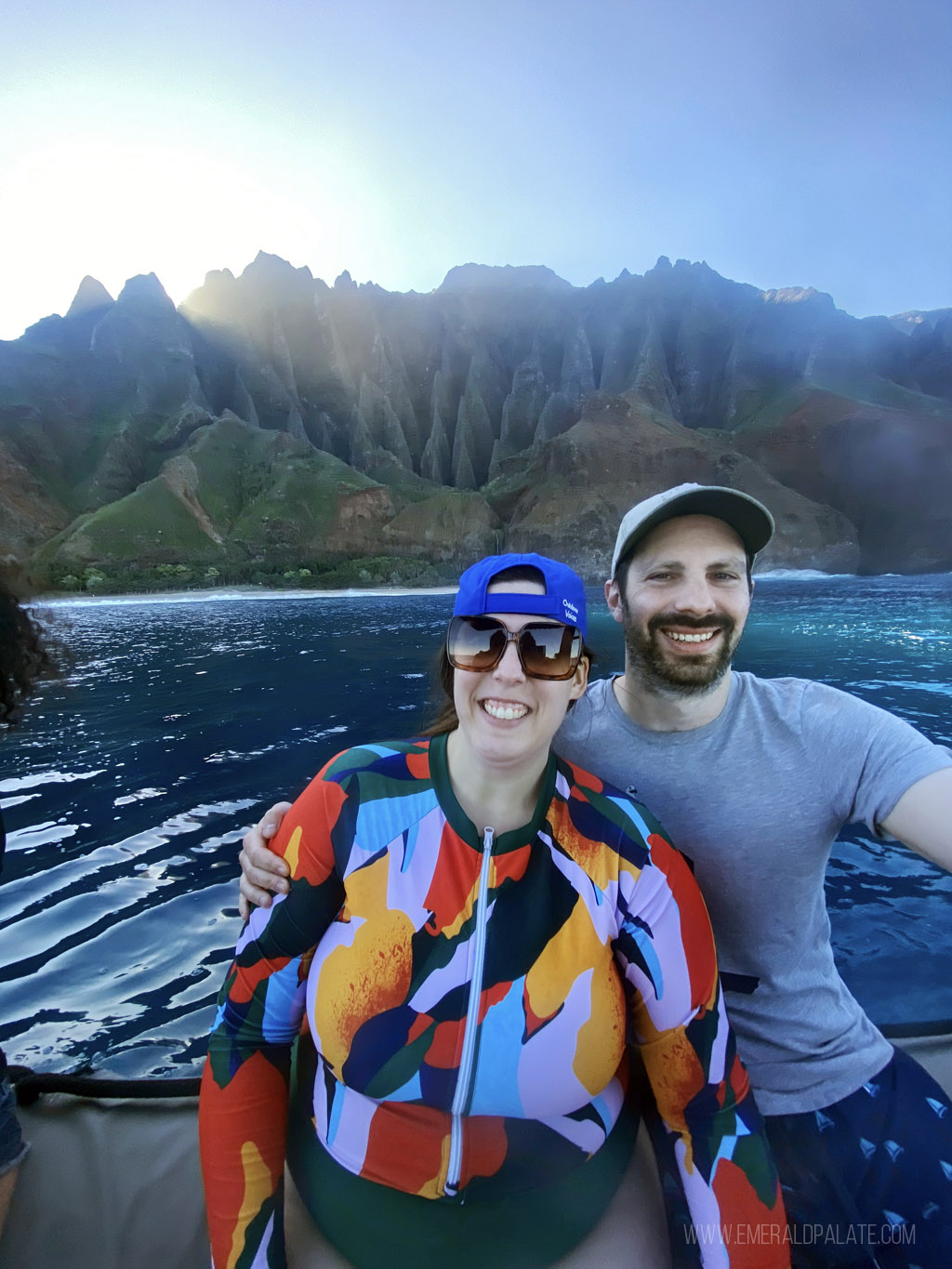 couple enjoying a boat tour on Kauai's Na Pali Coast