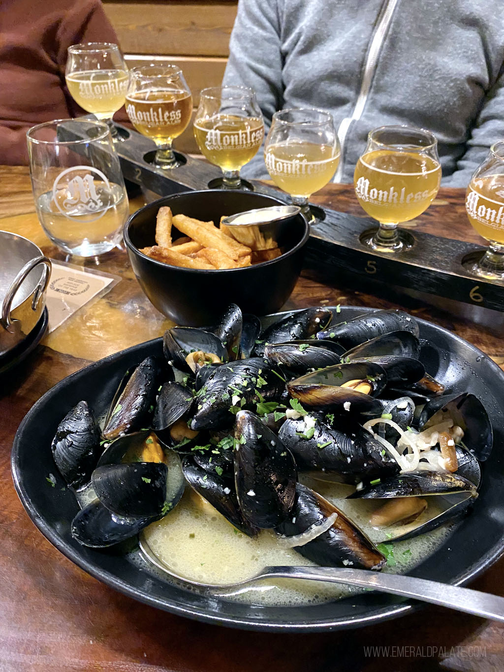 mussels, frites, and beer tasting flight from Monkless Ales in Bend, OR