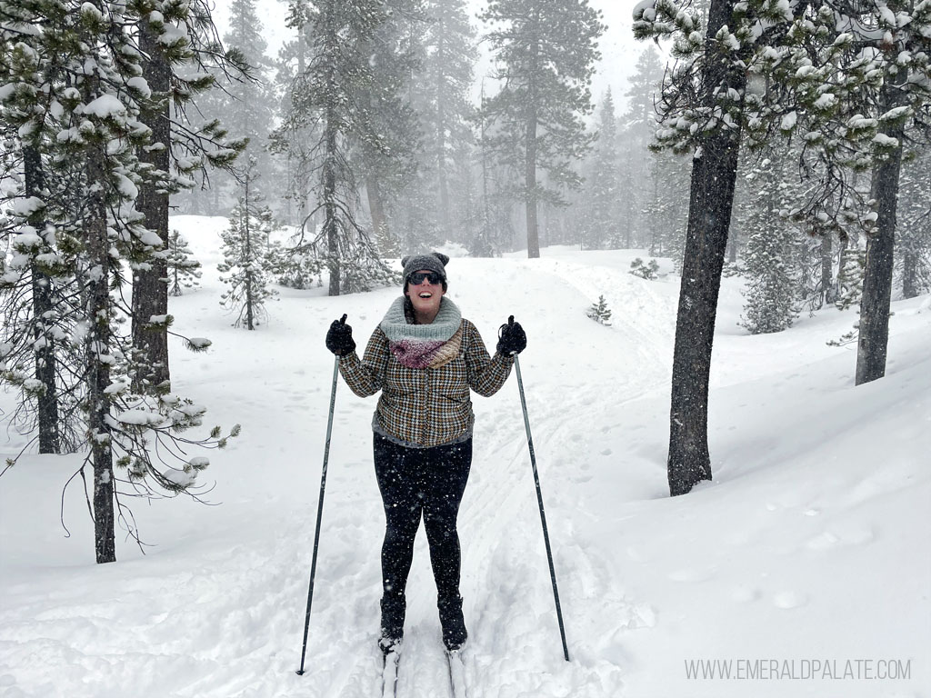 woman laughing cross country skiing at Edison Sno Park in Bend, Oregon