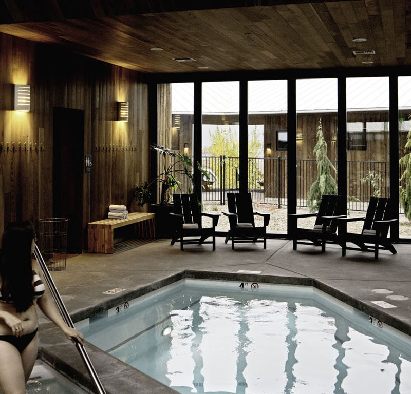 woman inside an indoor pool house at one of the best Pacific Northwest resorts