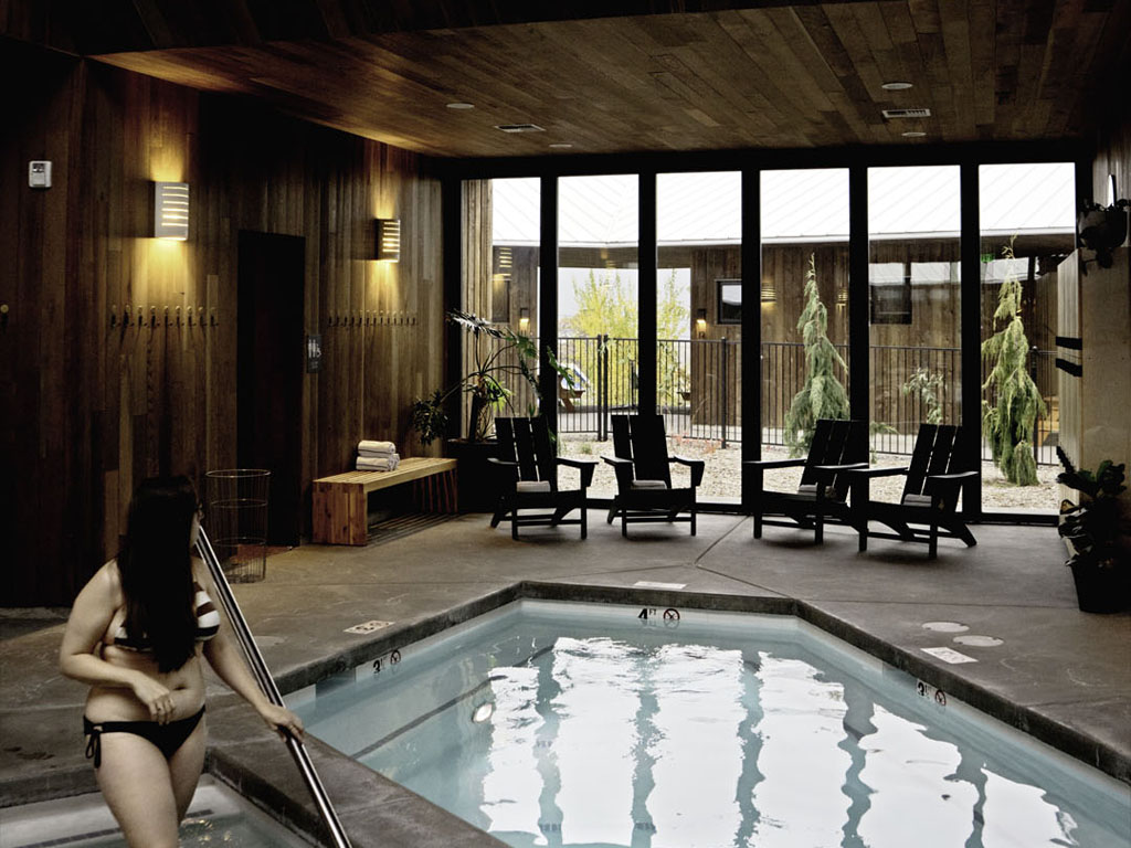 woman inside an indoor pool house at one of the best Pacific Northwest resorts