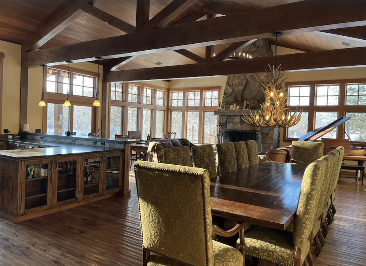 inside a luxurious cabin with beams in Winthrop