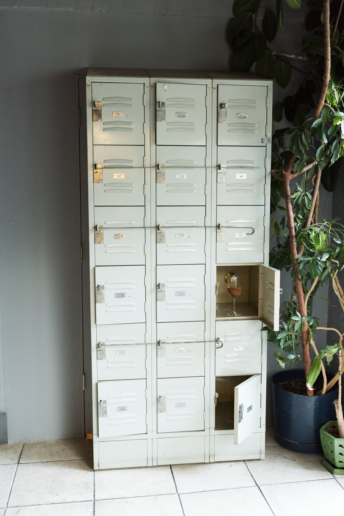 lockers at the entrance of a Prohibition era Seattle speakeasy cocktail bar