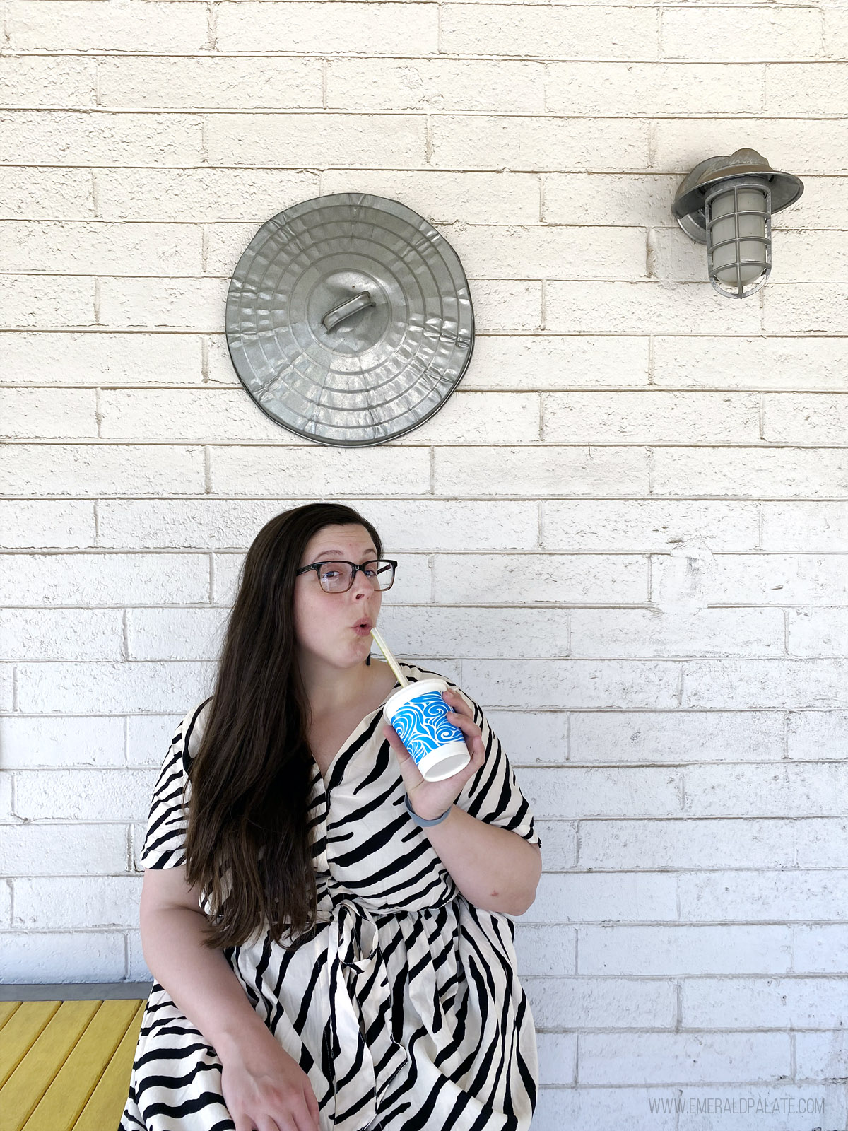 woman sipping on a date shake in Arizona