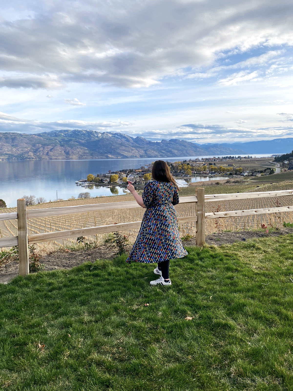 woman drinking wine, a must do during a weekend in Kelowna