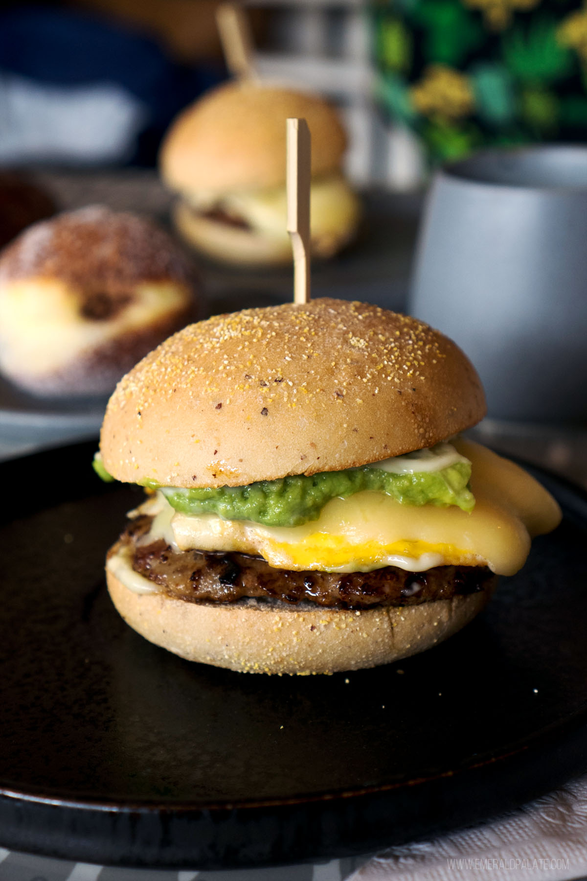 breakfast sandwich with sausage, avocado, egg, and cheese from a place you must visit on a weekend in Kelowna BC