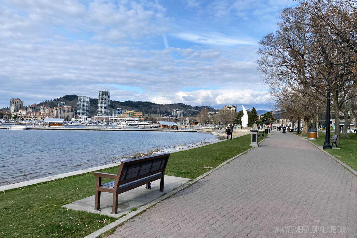 Okanagan Lake with a trail in City Park, a must walk during your Kelowna weekend