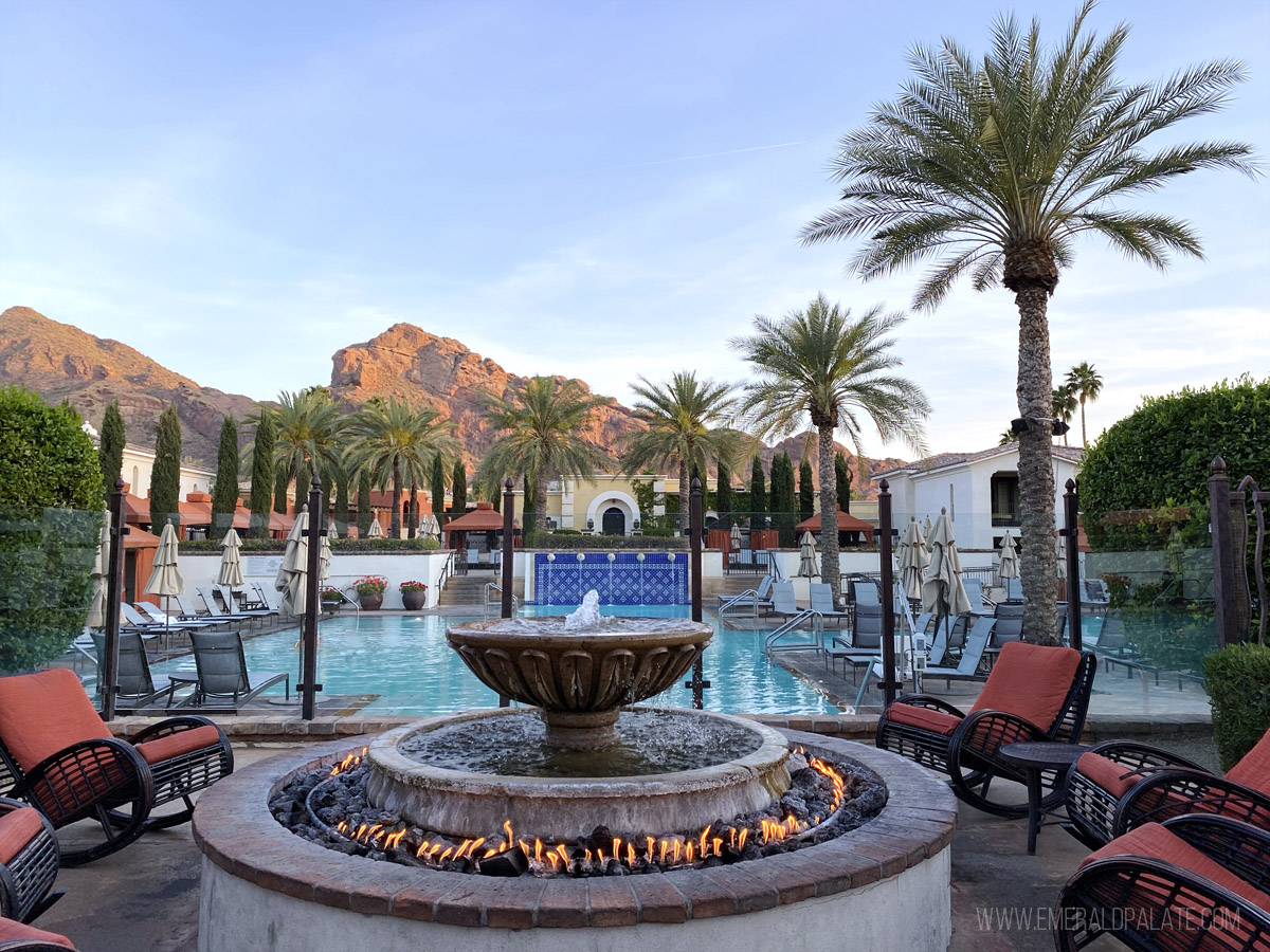 pool area with fountain and fire pit