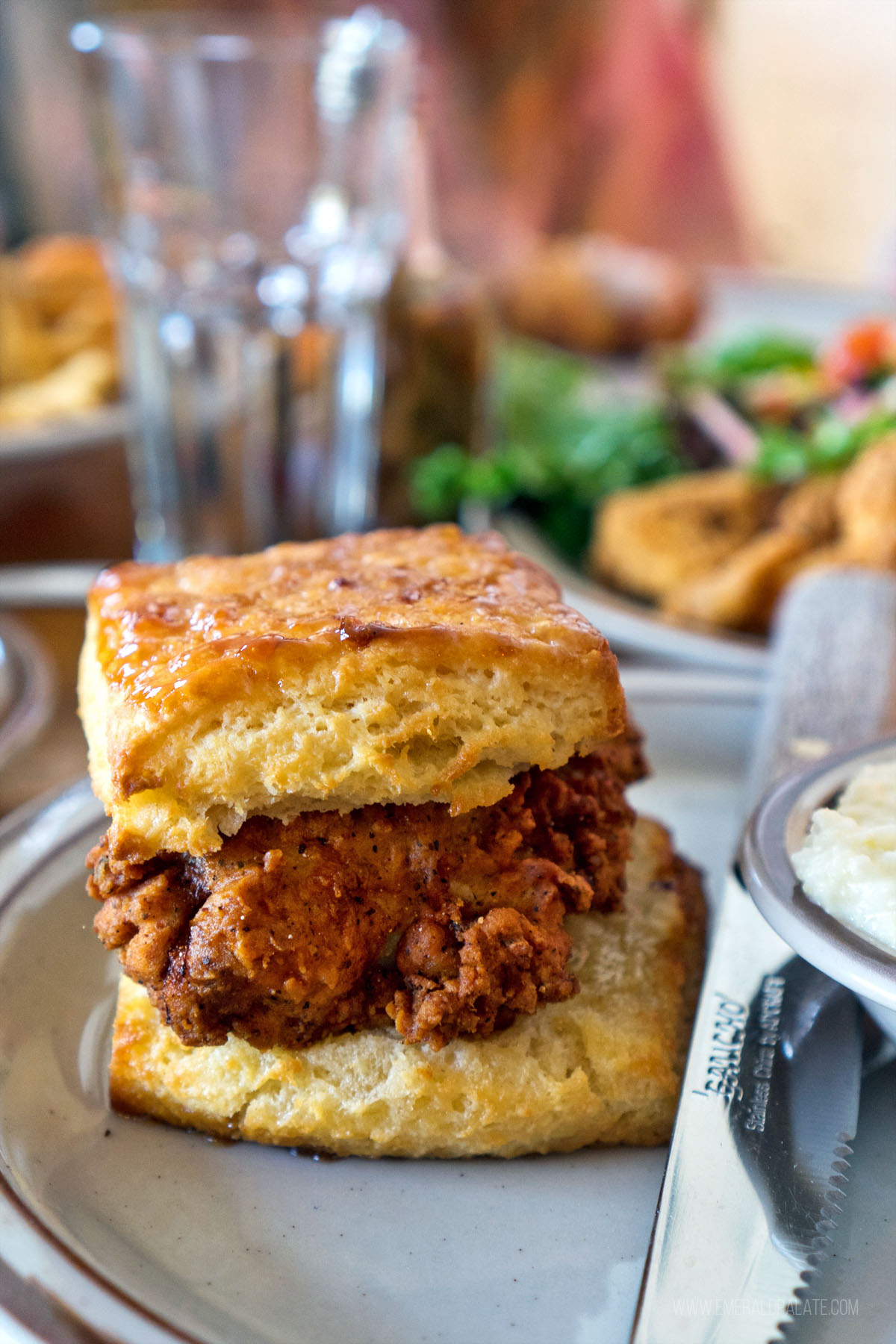 fried chicken sandwich with a biscuit