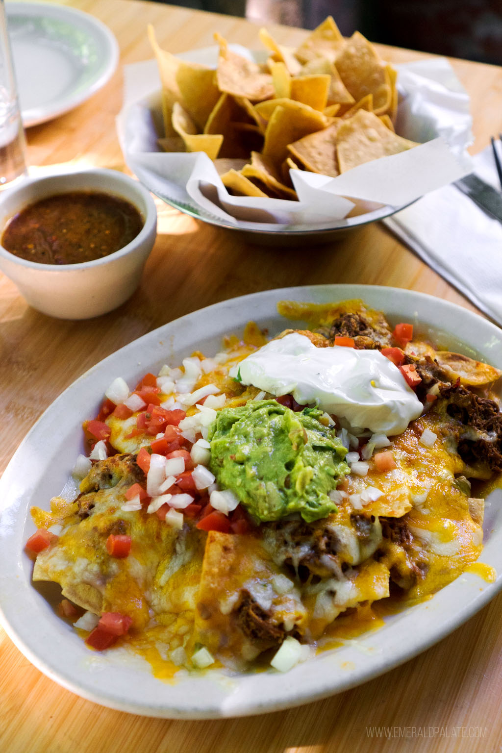 A plate of the best nachos in Seattle from a Mexican restaurant