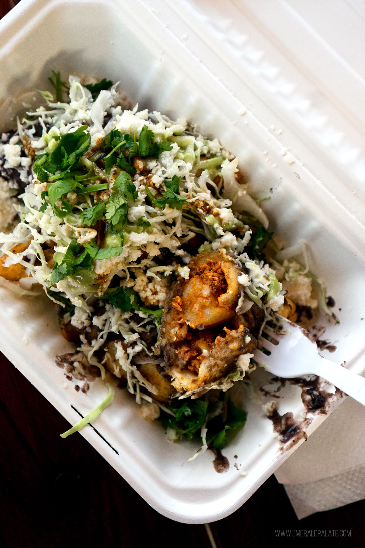 Mexican food in a takeout container from a Eugene, OR restaurant