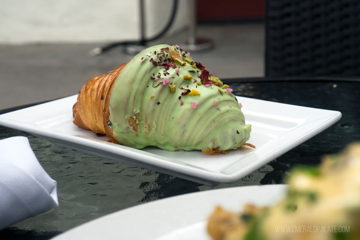 close up of a pistachio croissant, a must try on your Santa Barbara itinerary