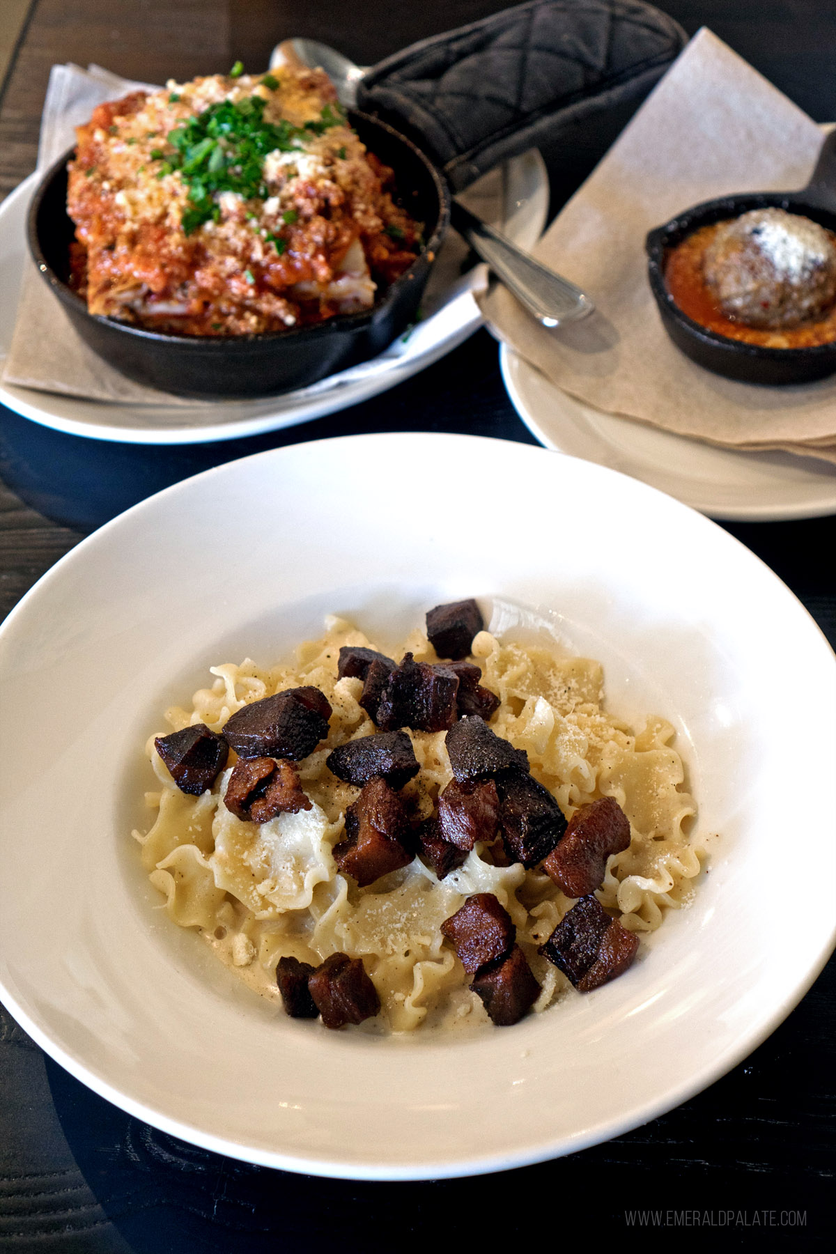 caico e pepe, lasagna, and meatball from an Italian restaurant in Paso Robles