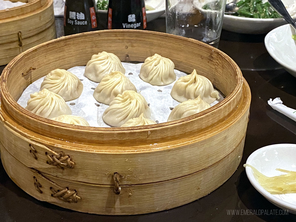 xiao long bao soup dumplings in a steamer basket