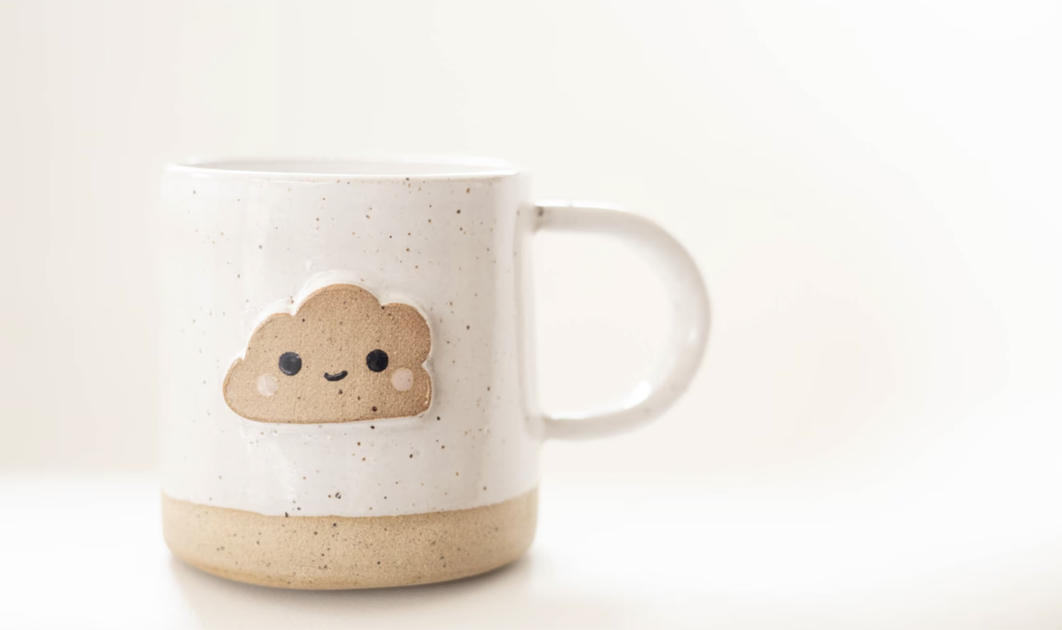 mug with a cloud happy face on it