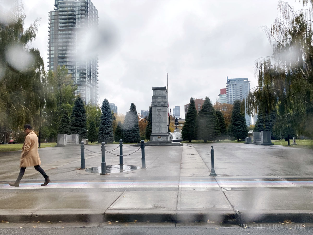 View of a plaza in Calgary from a rainy car window