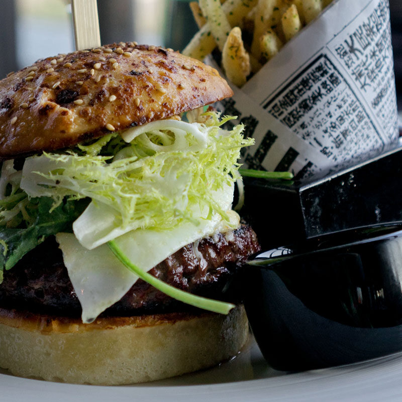 burger and fries from one of the best happy hour places in Seattle