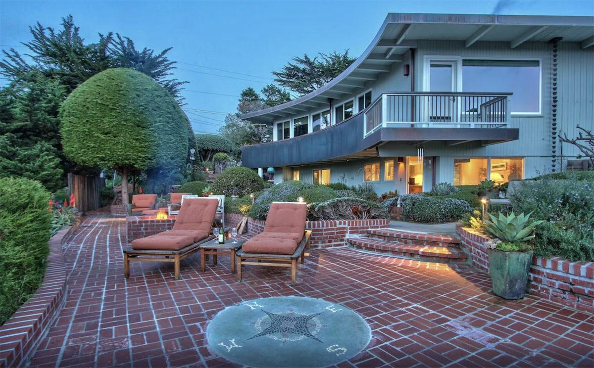 vacation home with a huge back patio