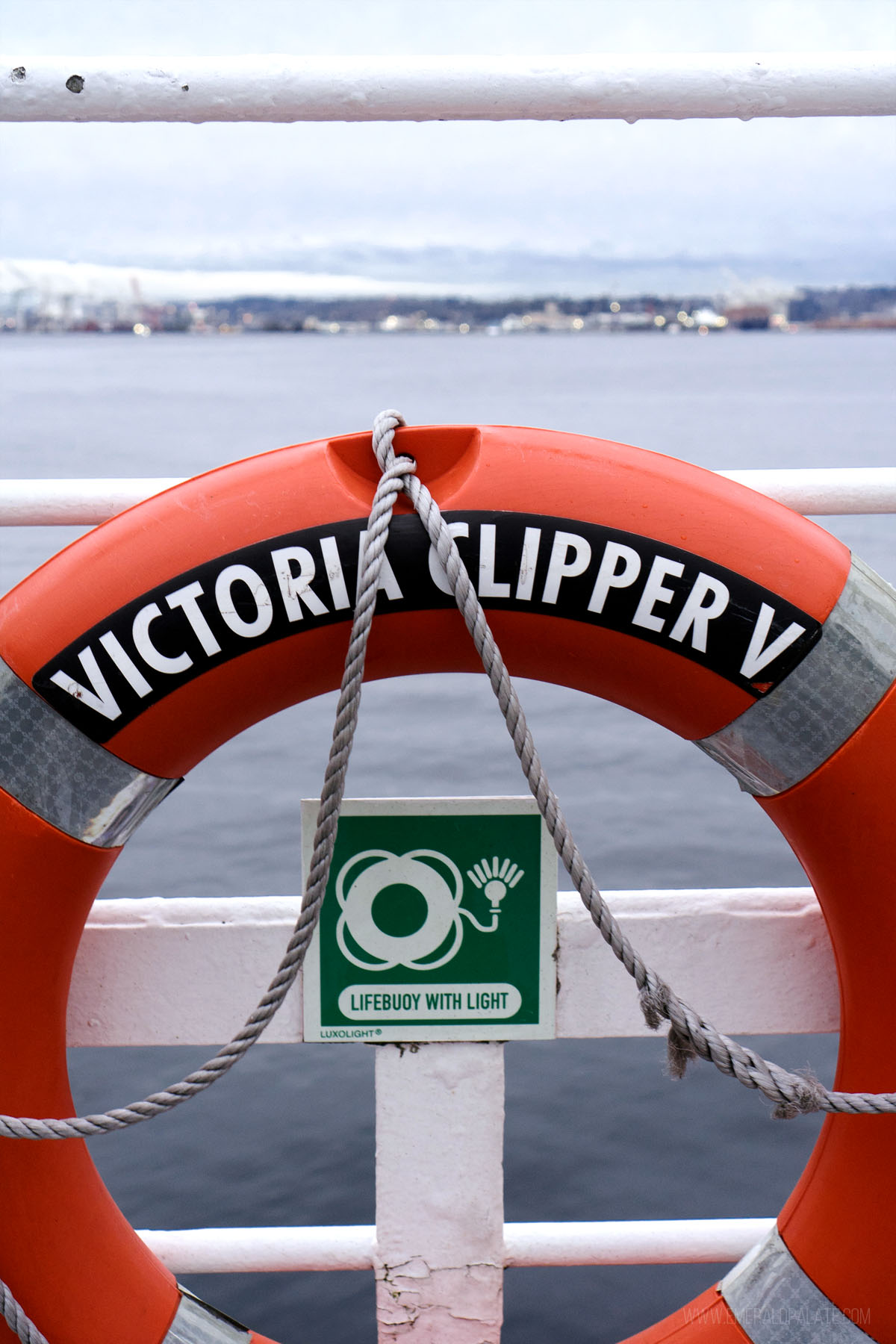 lifesaver that says Victoria Clipper V on a ferry to Victoria BC