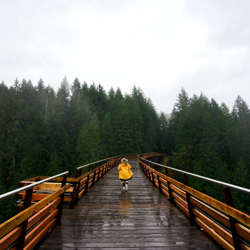 woman running on a trestle that's one of the most unique things to do in Victoria BC