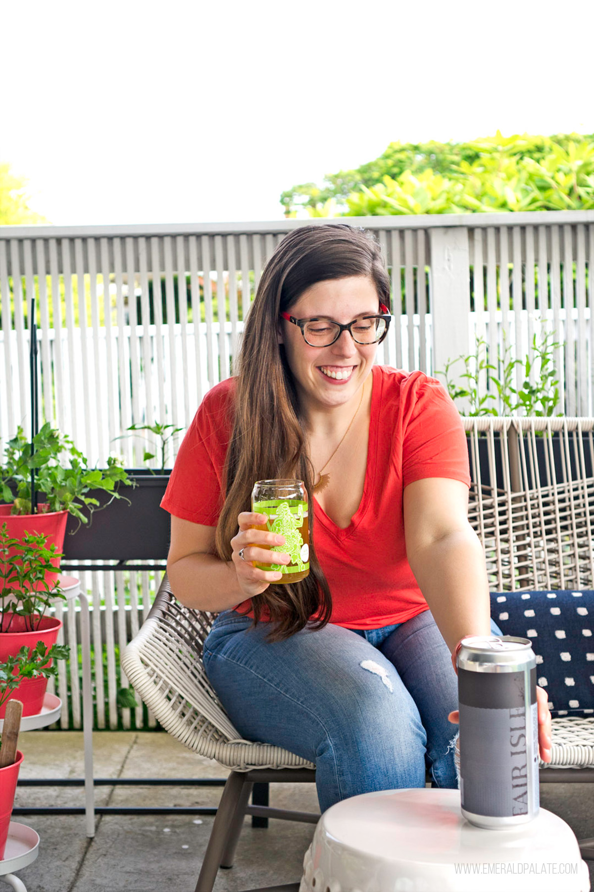 woman grabbing a beer can