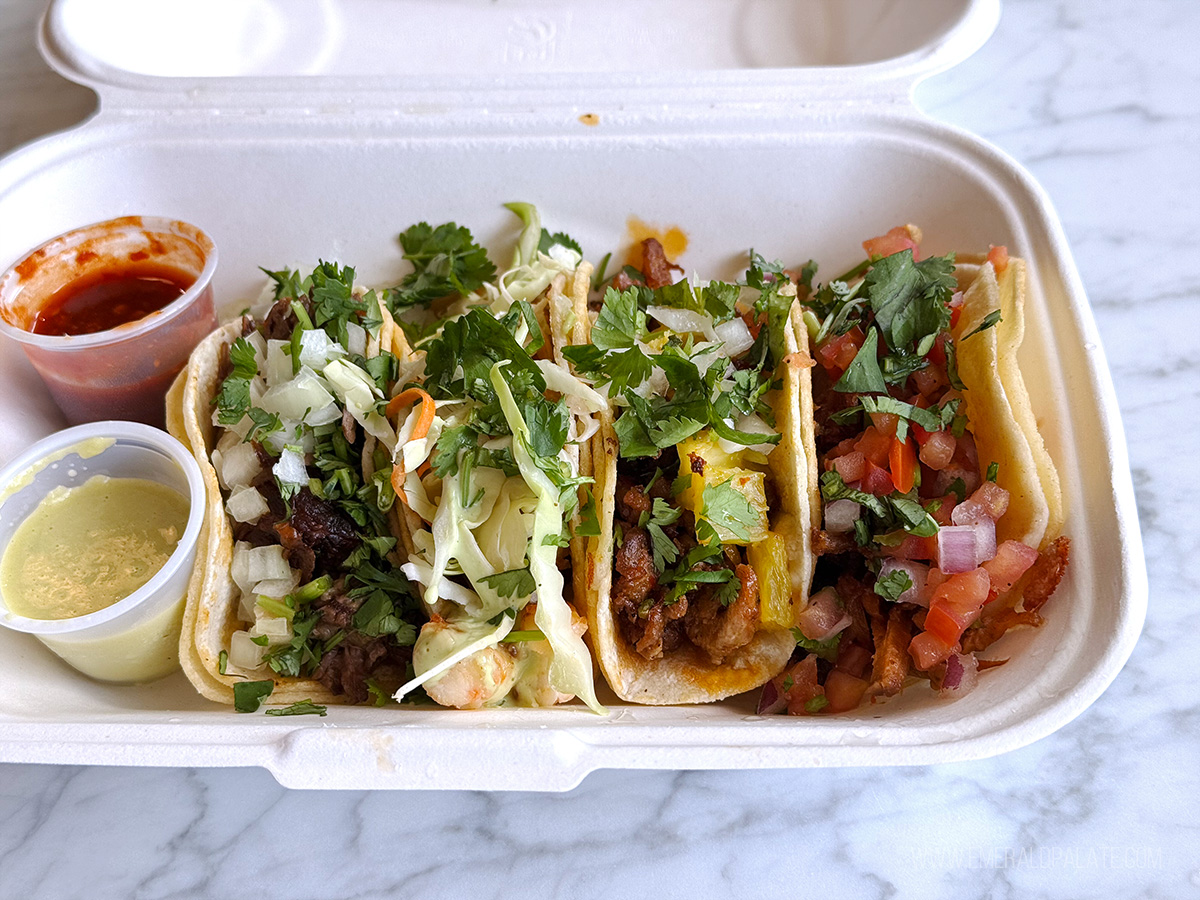plate of 4 street tacos with salsa