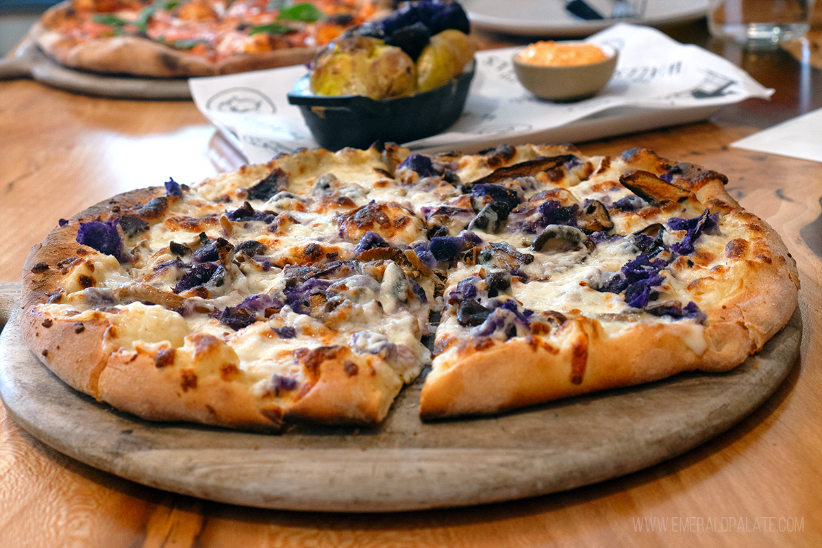 wood-fired pizza with mushrooms and potatoes