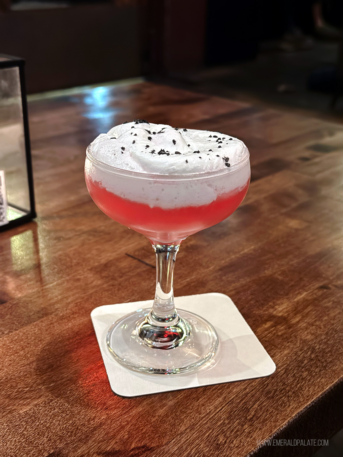 cocktail with coconut cream from one of the best cocktail bars in Seattle