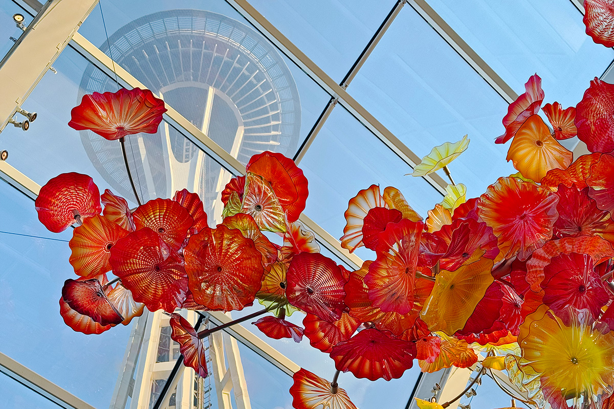 view of the Space Needle and Chihuly Glass on one of the best tours in Seattle