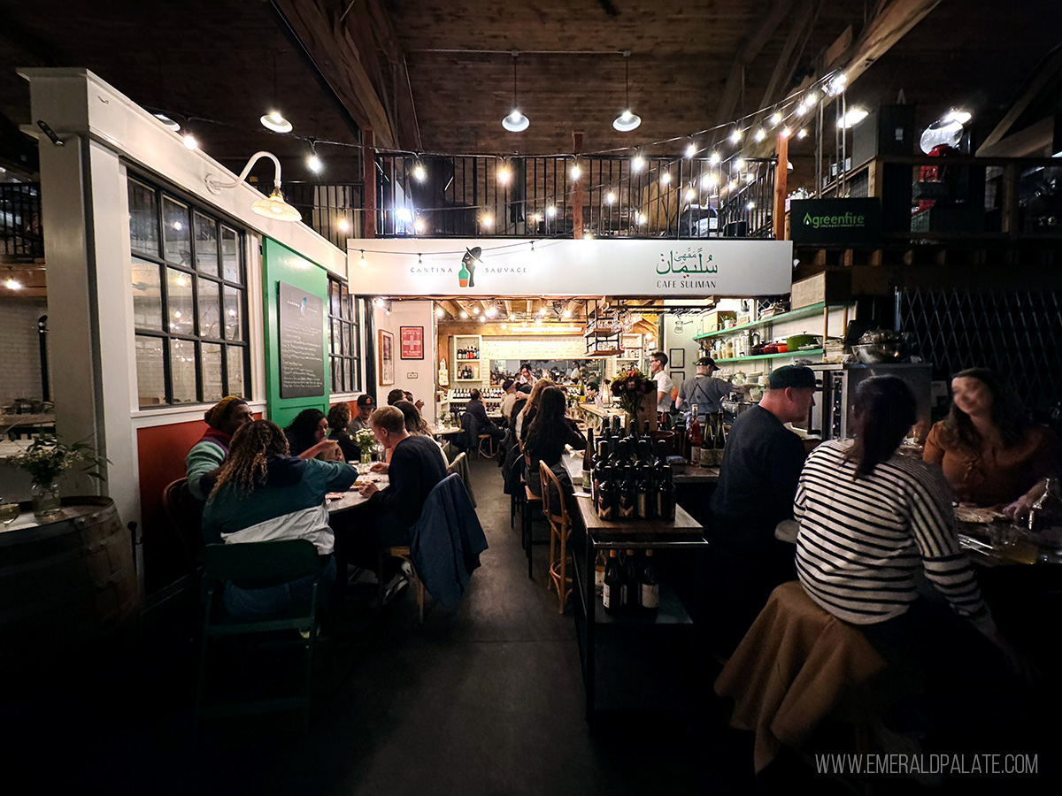 people enjoying wine at a cute wine bar in Seattle
