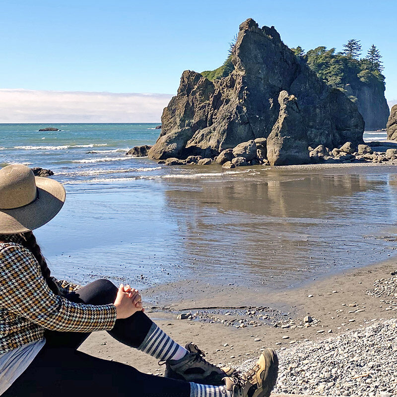 woman enjoying the view at one of the best national parks in the Pacific Northwest