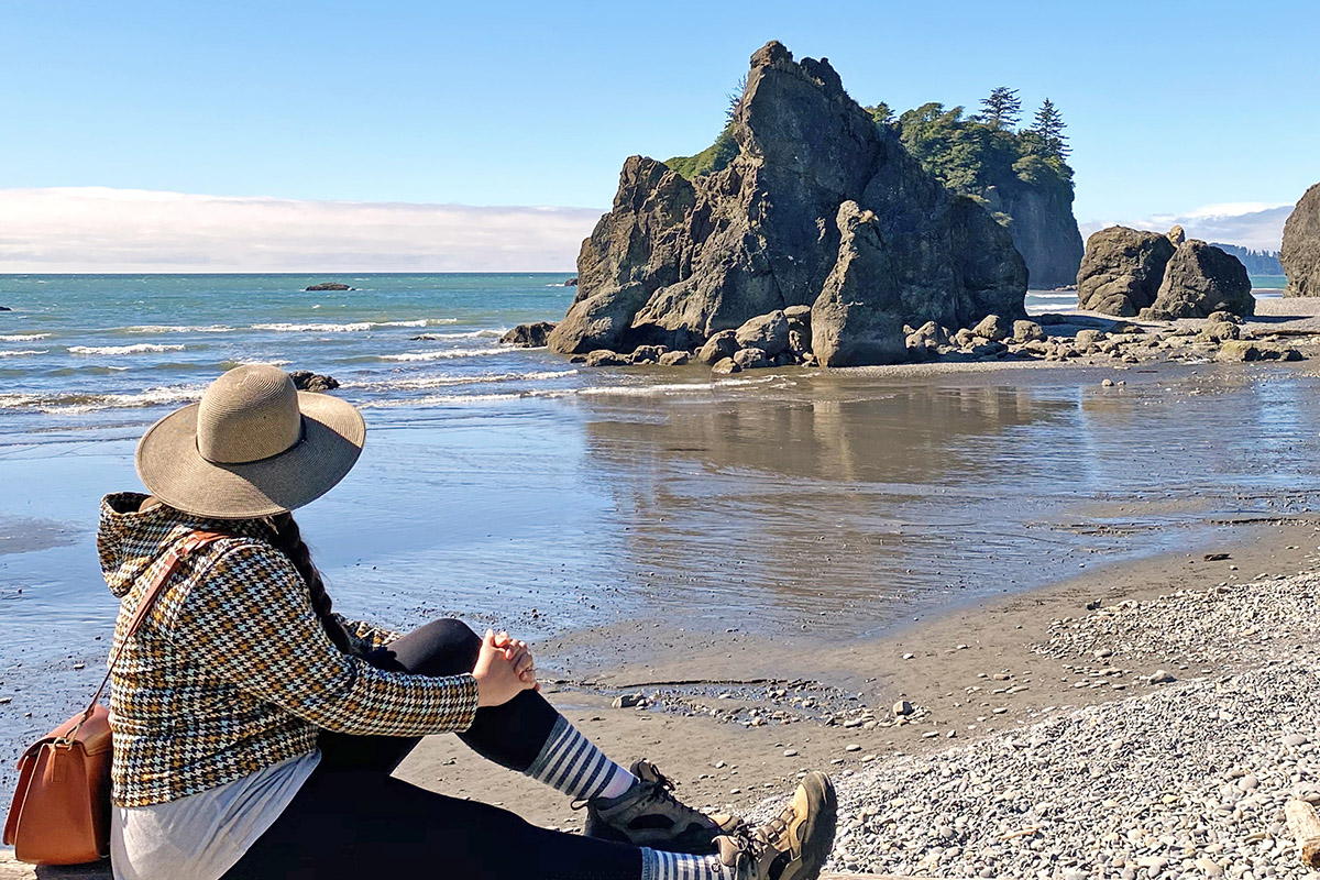 woman enjoying the view at one of the best national parks in the Pacific Northwest