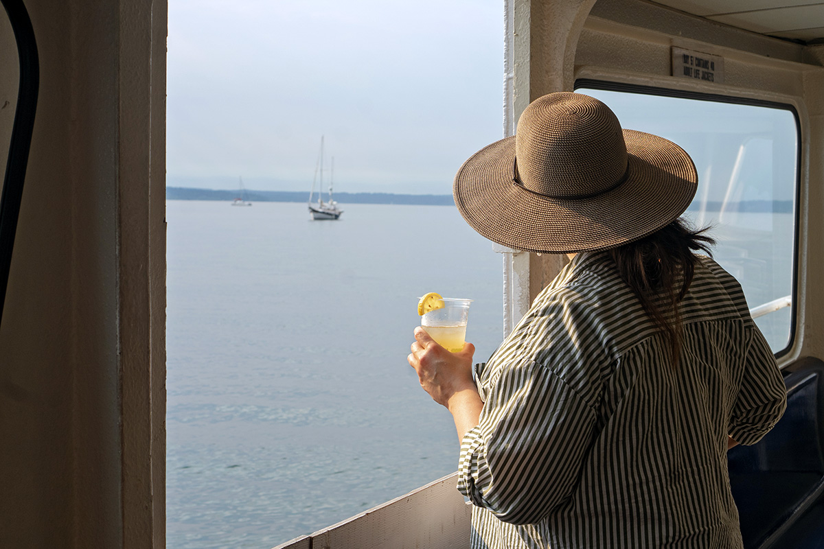 woman on a boat ride, one of the Instagrammable places in Seattle