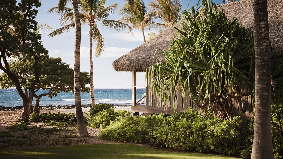 thatched roof hut at a luxury hotel in Hawaii