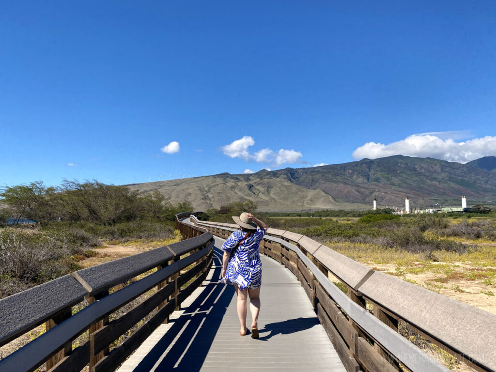 woman walking along the boardwalk at Keila Pond