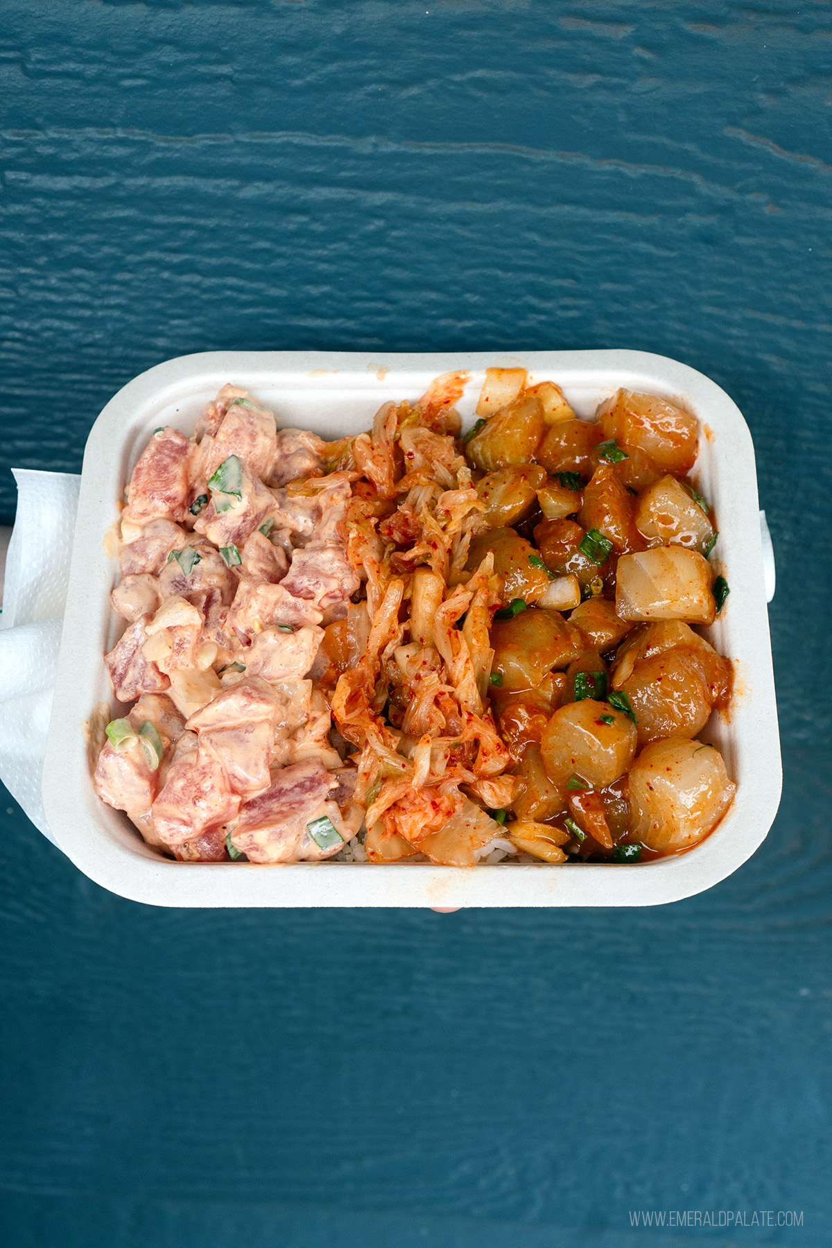 takeout container of poke from a Big Island restaurant