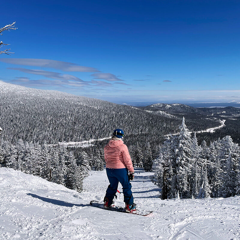 woman on the top of a trail during Bend, Oregon skiing