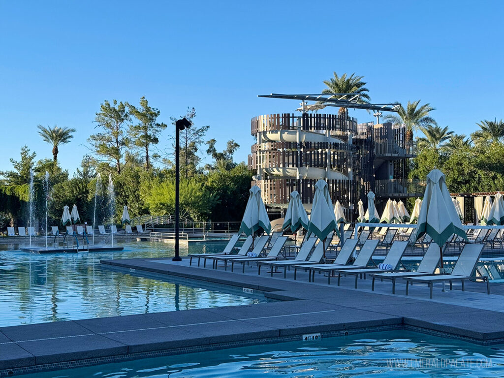 resort pool with a large slide in Scottsdale
