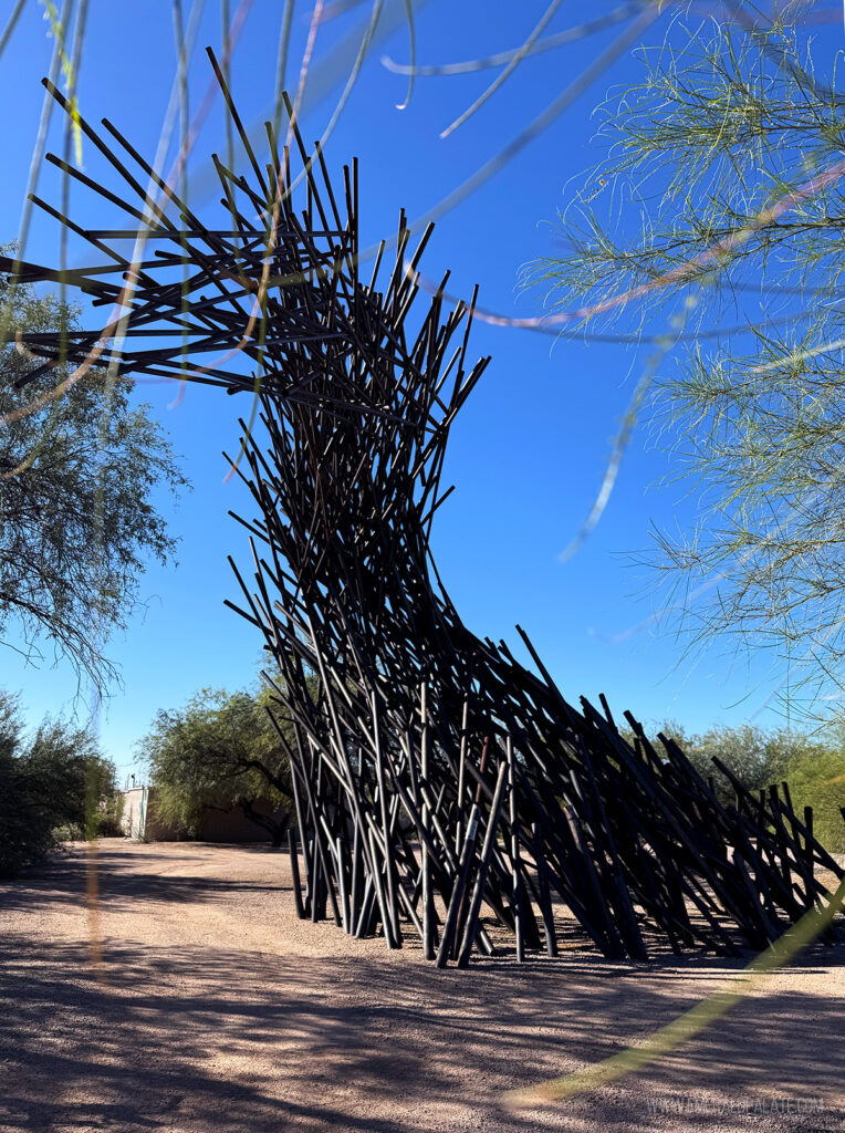 modern art structure that's a bunch of pipes meant to look like a huge wave
