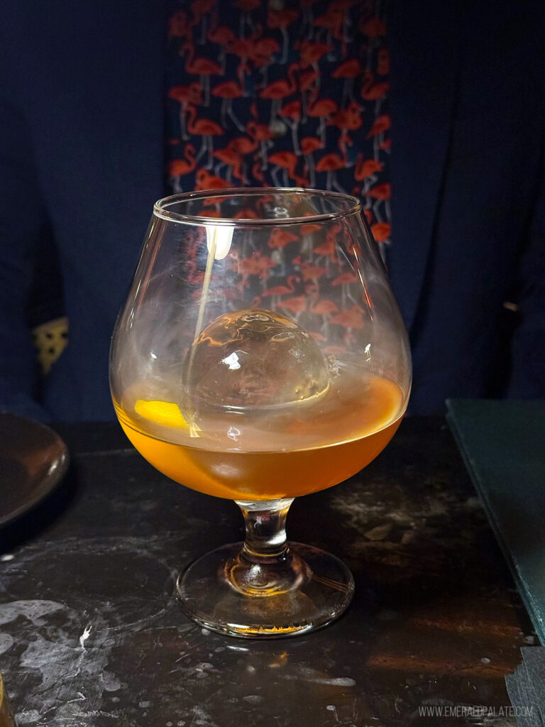 whiskey cocktail with smoke coming out of it