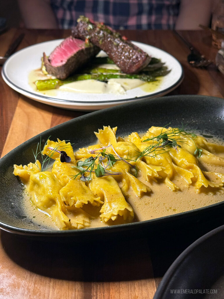 stuffed pasta and perfectly-cooked steak in the background from one of the most unique Scottsdale restaurants