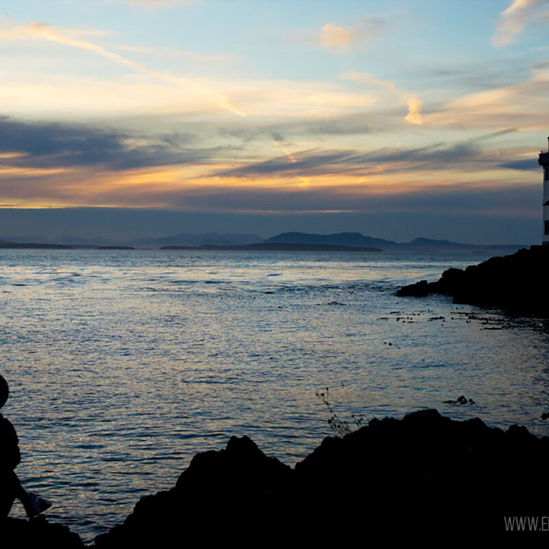 How to get to San Juan Islands to see this view: Lime Kiln State Park lighthouse at sunset