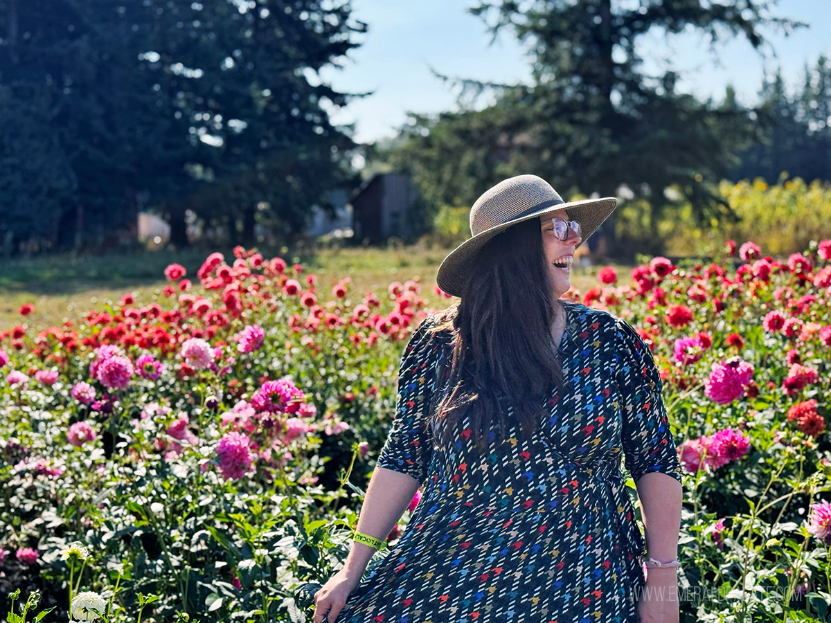 woman laughing at a flower farm, one of the best things to do in Lynden WA