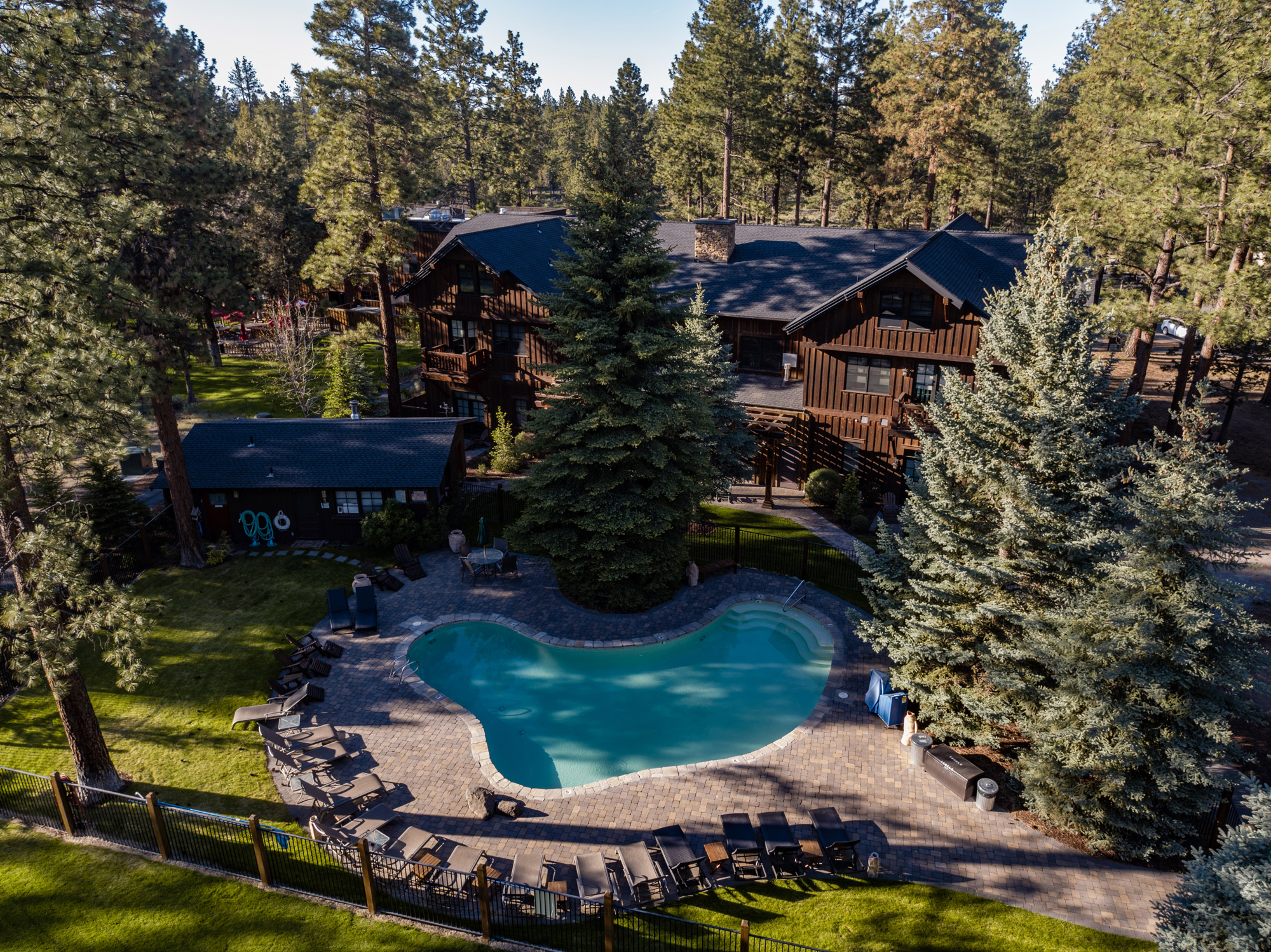 FivePine Lodge and Spa exterior of FivePine Lodge and Spa in Sisters Oregon with view of pool