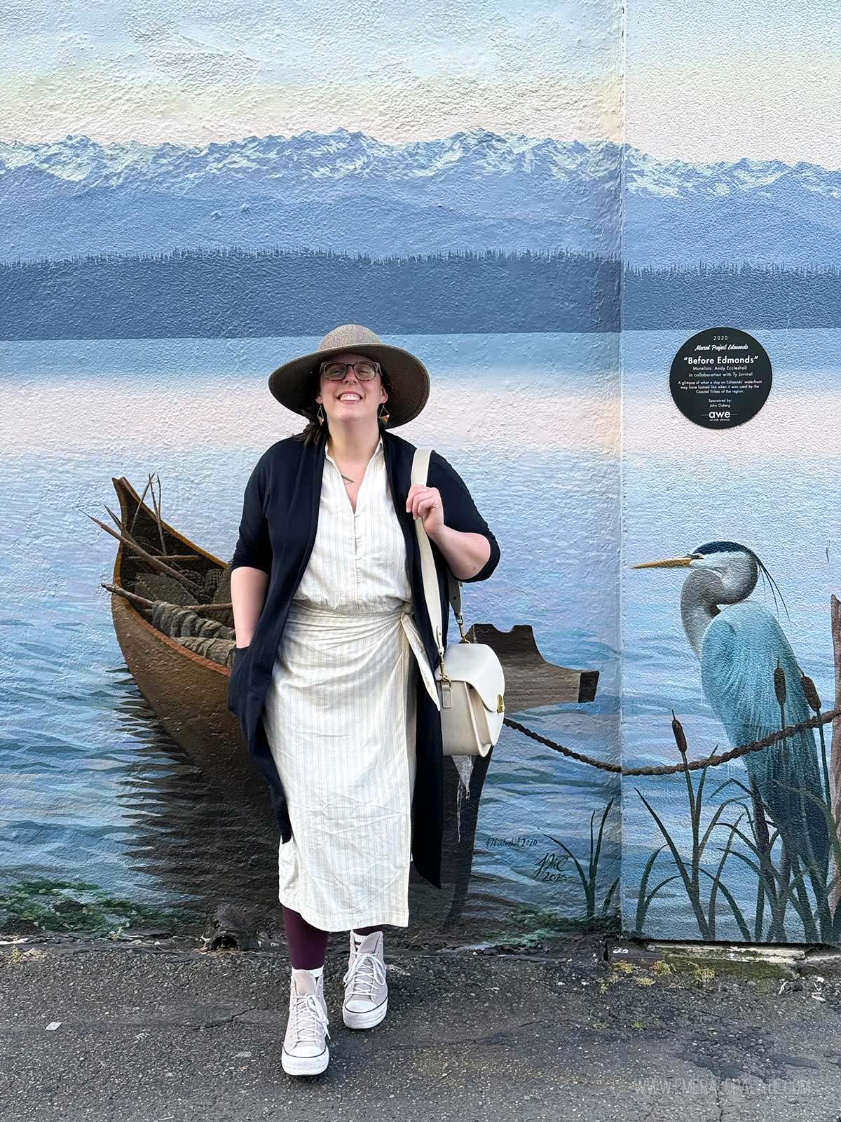 woman in front of an art mural in Edmonds WA