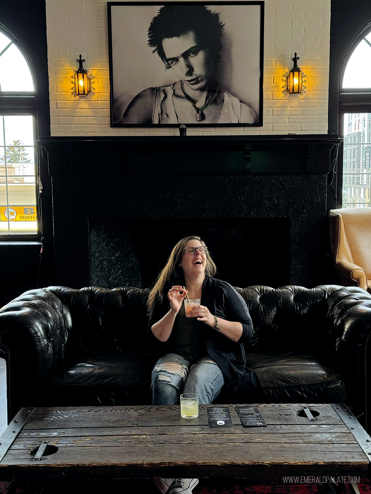 woman laughing at El Sid, a cocktail bar in Everett WA