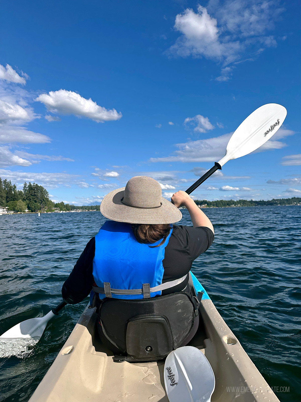 woman kayaking on Lake Stevens, WA