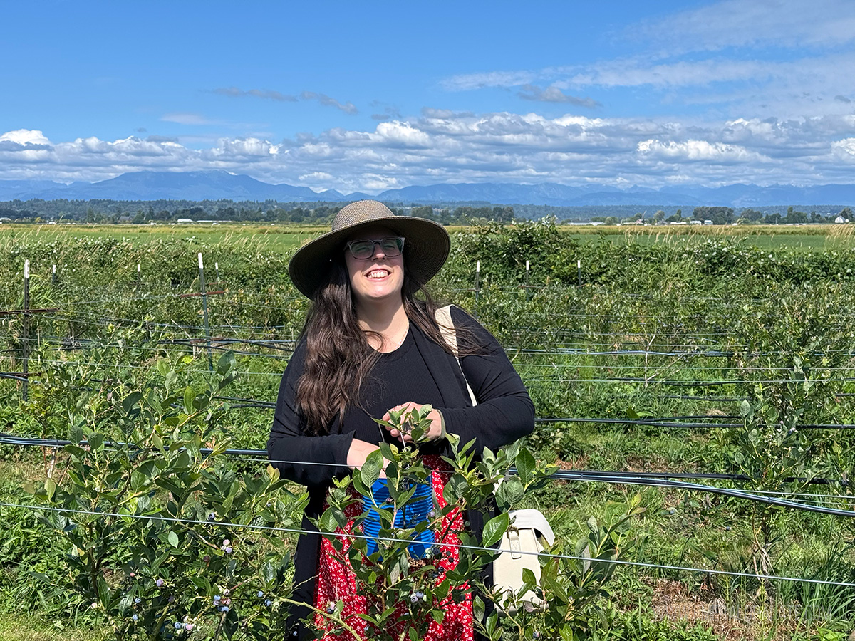 women blueberry picking, one of the best things to do in Snohomish